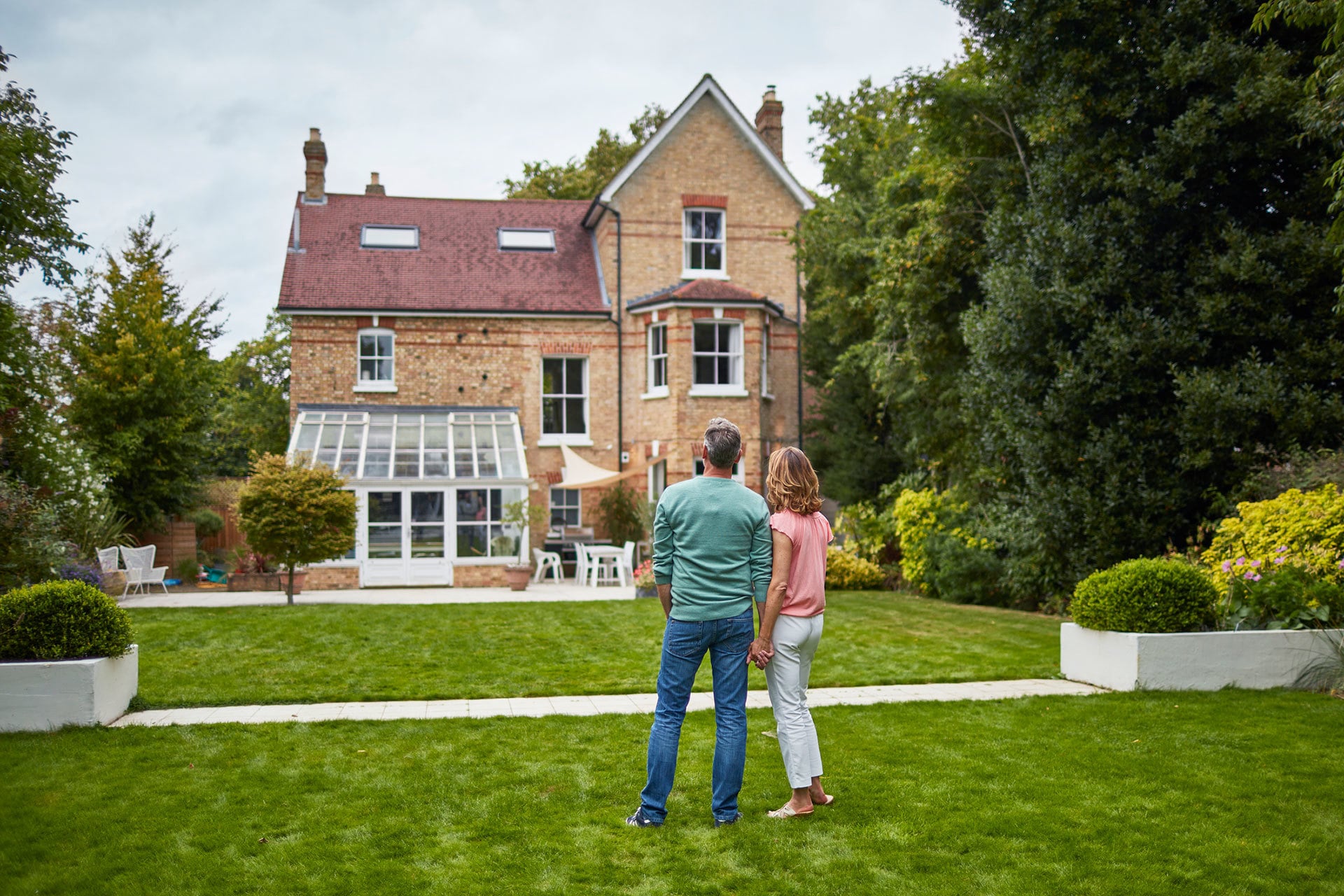 Couple looking at a house